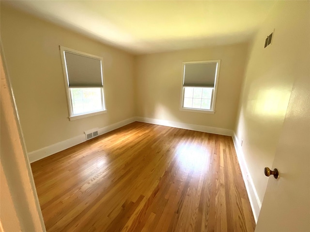 26 Alden Rd, Poughkeepsie, NY 12603 - unfurnished room with plenty of natural light and wood finished floors