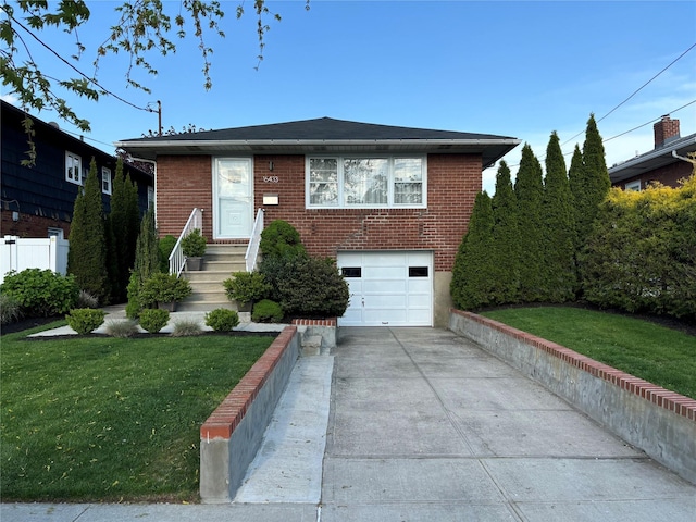 164-33 97th St, Howard Beach, NY 11414 - view of front of home with an attached garage, brick siding, driveway, and a front lawn