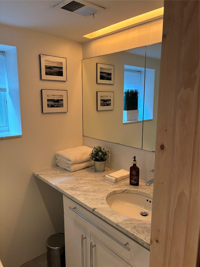 164-33 97th St, Howard Beach, NY 11414 - bathroom featuring vanity and visible vents