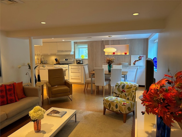 164-33 97th St, Howard Beach, NY 11414 - living room featuring light floors, visible vents, and recessed lighting
