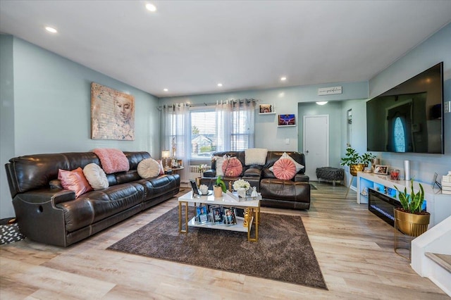 1075 Frances Dr, Valley Stream, NY 11580 - living area with wood finished floors and recessed lighting