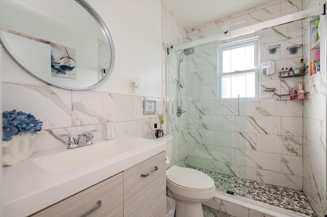 1075 Frances Dr, Valley Stream, NY 11580 - full bath with a stall shower, vanity, and tile walls