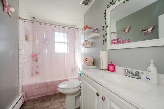1075 Frances Dr, Valley Stream, NY 11580 - bathroom featuring baseboard heating, shower / tub combo with curtain, vanity, and wood finished floors