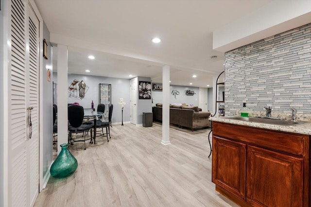 1075 Frances Dr, Valley Stream, NY 11580 - living room with light wood finished floors and recessed lighting