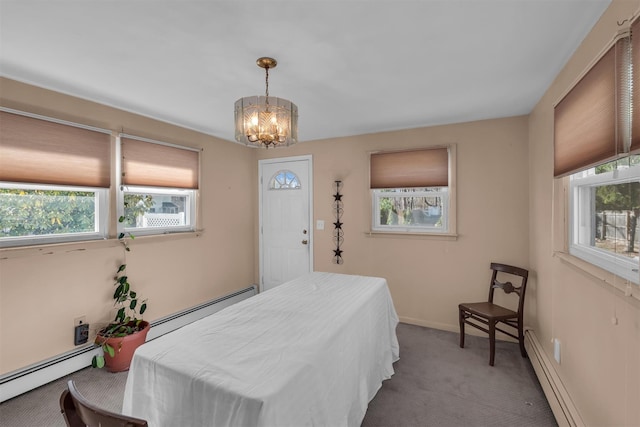 carpeted bedroom with a baseboard radiator, baseboards, baseboard heating, and an inviting chandelier