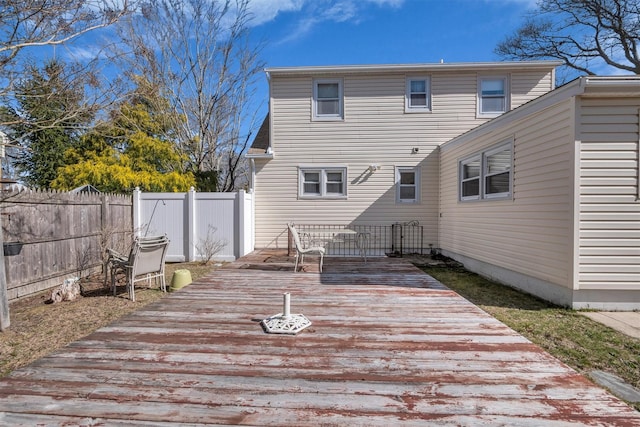 wooden deck featuring fence