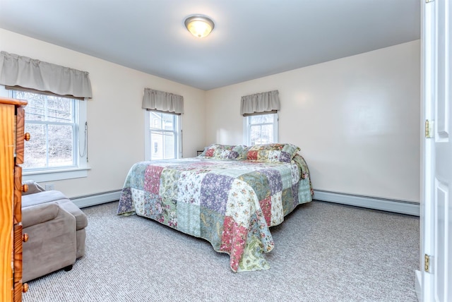 carpeted bedroom with a baseboard radiator