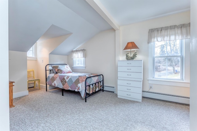 carpeted bedroom with baseboards, lofted ceiling, and a baseboard radiator