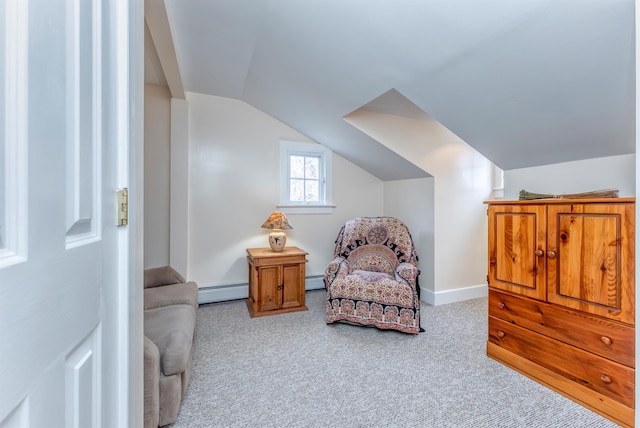 living area with vaulted ceiling, carpet, baseboards, and baseboard heating