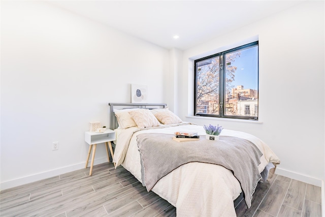 941 57th St Unit 4B, Brooklyn, NY 11219 - bedroom with recessed lighting, wood finished floors, and baseboards