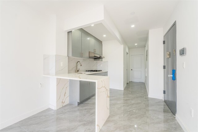941 57th St Unit 4B, Brooklyn, NY 11219 - hallway featuring a sink, baseboards, and recessed lighting