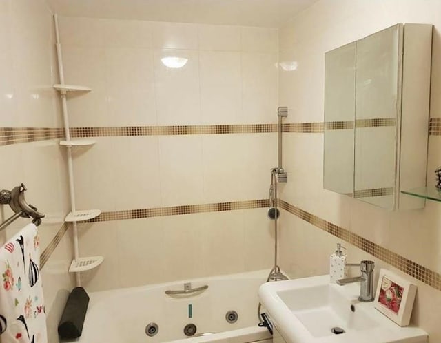31-12 Union St Unit 4A, Flushing, NY 11354 - bathroom featuring a sink and a whirlpool tub