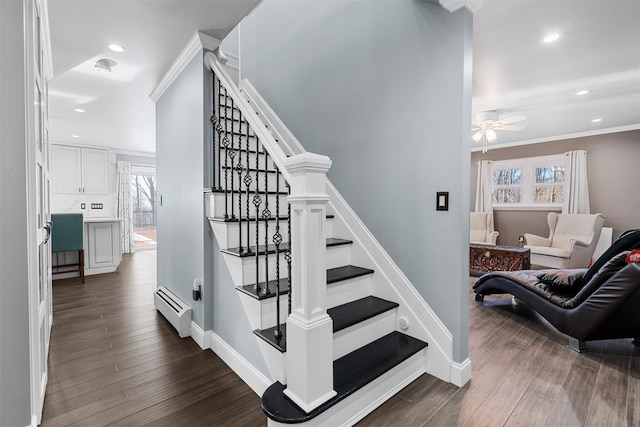 stairs with recessed lighting, a baseboard radiator, ceiling fan, and a wealth of natural light
