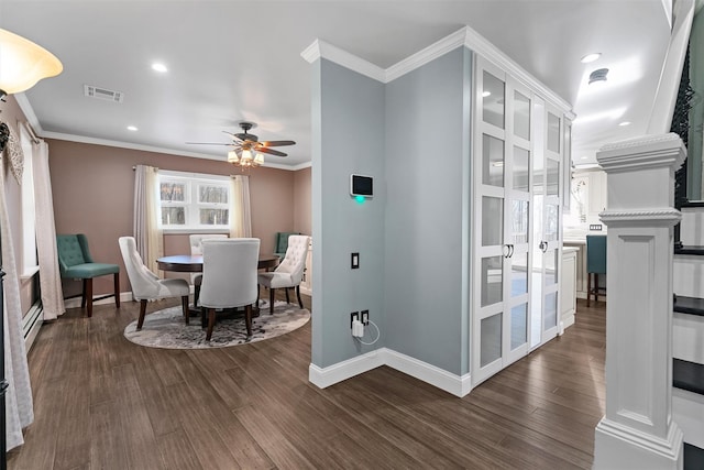 dining area featuring a ceiling fan, baseboards, dark wood-type flooring, visible vents, and ornamental molding