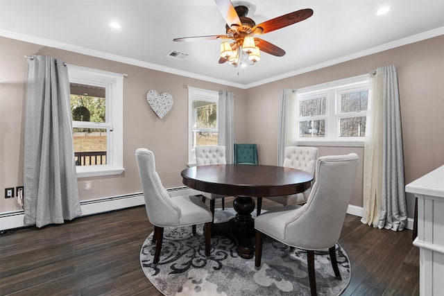 dining area with visible vents, a ceiling fan, dark wood-type flooring, and a healthy amount of sunlight
