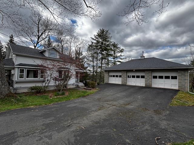 191 Gables Rd, Narrowsburg, NY 12764 - view of front of property featuring stone siding and a garage