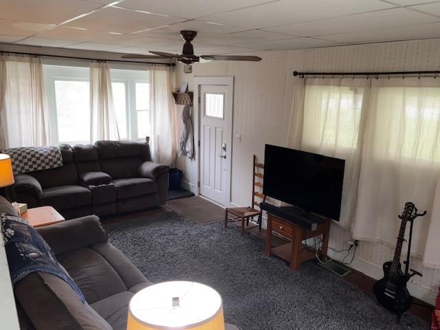 191 Gables Rd, Narrowsburg, NY 12764 - carpeted living room featuring a ceiling fan and a paneled ceiling
