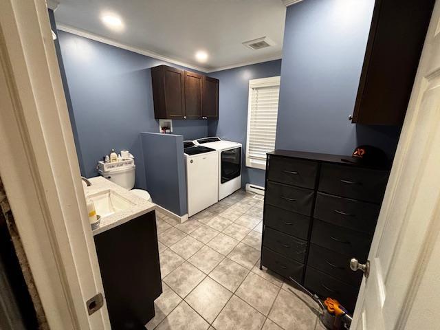 191 Gables Rd, Narrowsburg, NY 12764 - clothes washing area featuring independent washer and dryer, cabinet space, light tile patterned floors, ornamental molding, and recessed lighting