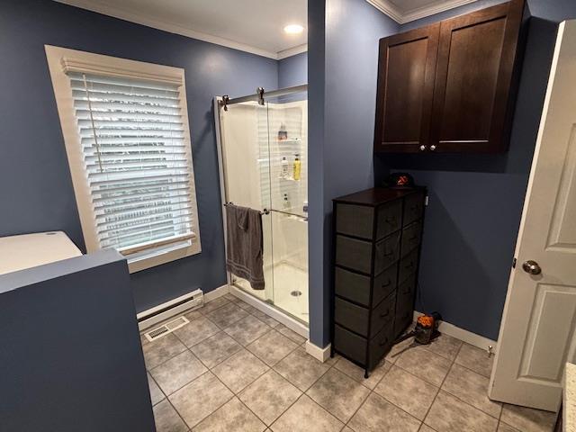 191 Gables Rd, Narrowsburg, NY 12764 - full bathroom with crown molding, a stall shower, a baseboard heating unit, tile patterned floors, and baseboards