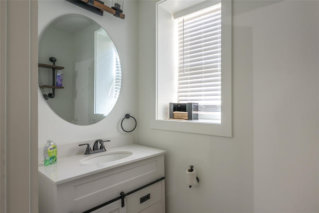 bathroom featuring vanity and plenty of natural light