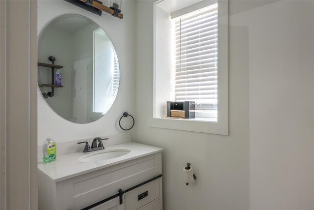 bathroom featuring vanity and plenty of natural light