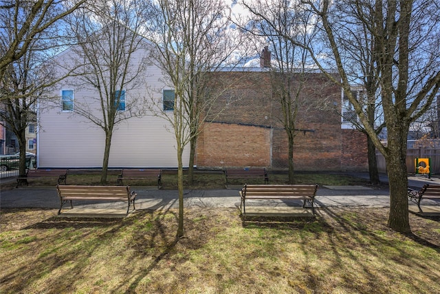 surrounding community featuring a lawn