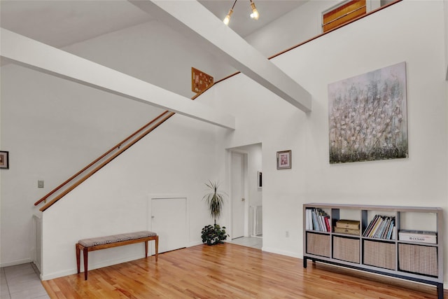 18 Saint George Dr, Shirley, NY 11967 - interior space with baseboards, a high ceiling, and wood finished floors