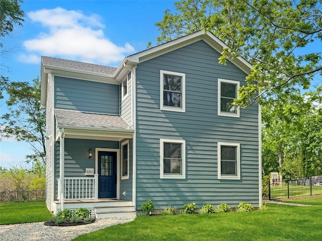 550 Madison Ave, Greenport, NY 11944 - view of front of property with a porch and roof with shingles