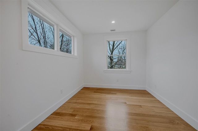 550 Madison Ave, Greenport, NY 11944 - spare room featuring light wood-style flooring, baseboards, and recessed lighting