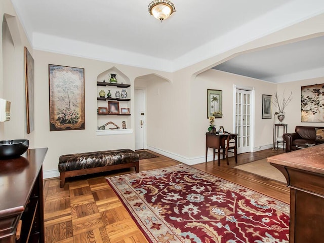 2166 Bronx Park E Unit 1G, Bronx, NY 10462 - living room with baseboards and arched walkways