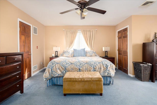 bedroom with baseboards, carpet floors, and visible vents
