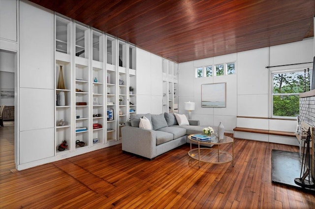 living room with wooden ceiling and wood-type flooring