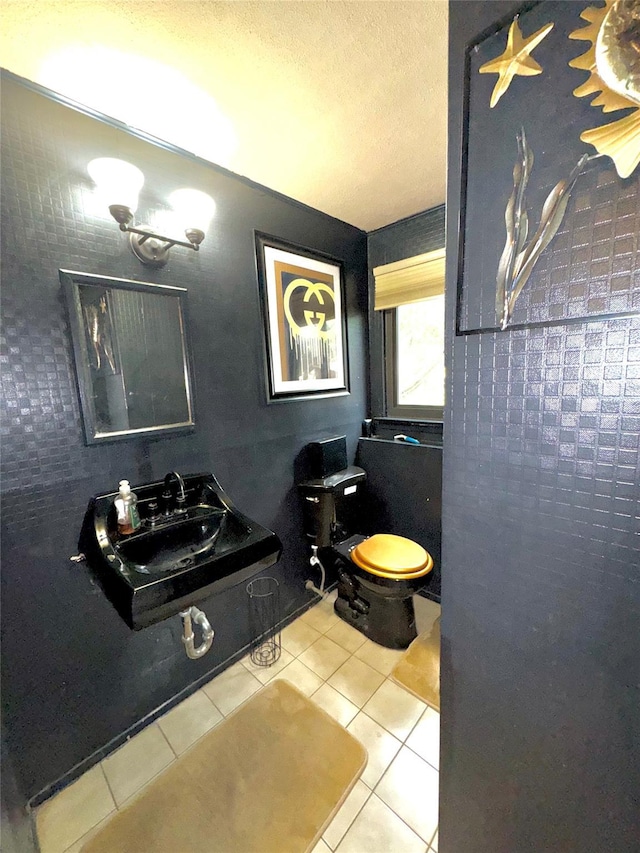 15 Highland Ave, Chestnut Ridge, NY 10977 - bathroom featuring tile patterned floors, toilet, a textured ceiling, and a sink
