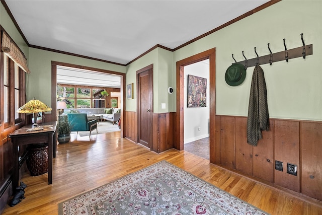 35 Riverview Trl, Croton-On-Hudson, NY 10520 - entrance foyer featuring wood finished floors, a wainscoted wall, crown molding, and wood walls