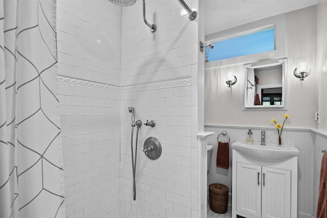 35 Riverview Trl, Croton-On-Hudson, NY 10520 - bathroom with a wainscoted wall, tiled shower, and vanity
