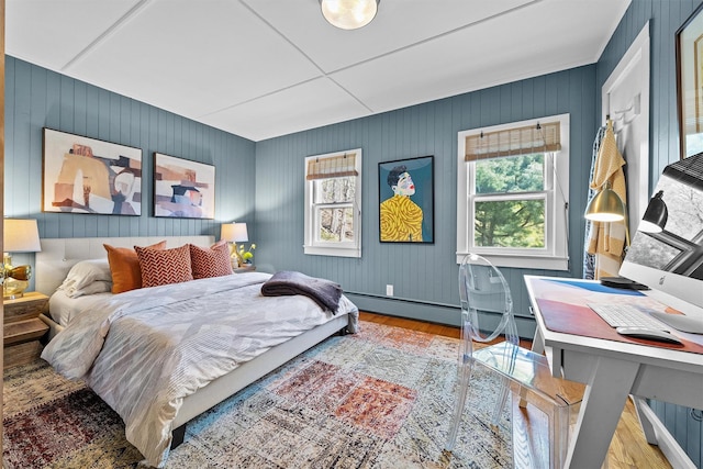 35 Riverview Trl, Croton-On-Hudson, NY 10520 - bedroom featuring wood finished floors, multiple windows, a baseboard radiator, and a desk