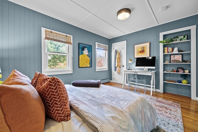 35 Riverview Trl, Croton-On-Hudson, NY 10520 - bedroom with wood finished floors, baseboard heating, and wooden walls