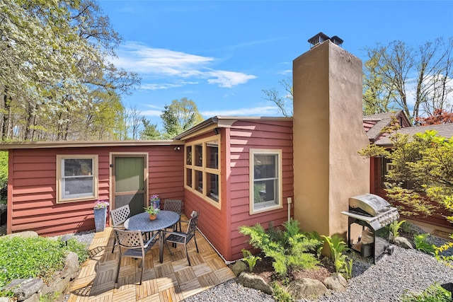 35 Riverview Trl, Croton-On-Hudson, NY 10520 - back of house featuring a chimney