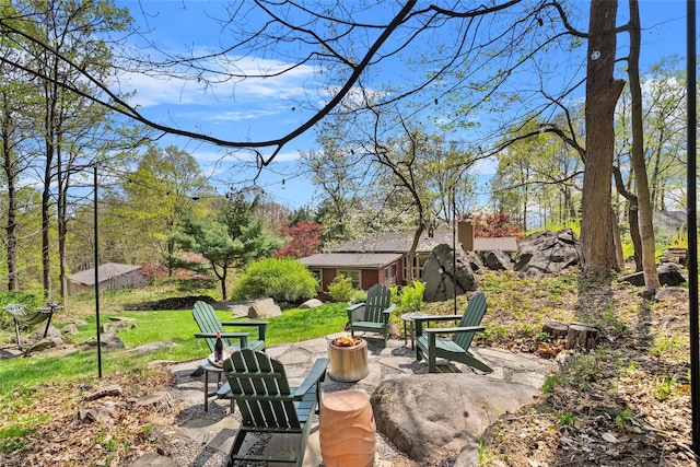 35 Riverview Trl, Croton-On-Hudson, NY 10520 - view of yard featuring a fire pit, a patio, and an outdoor structure