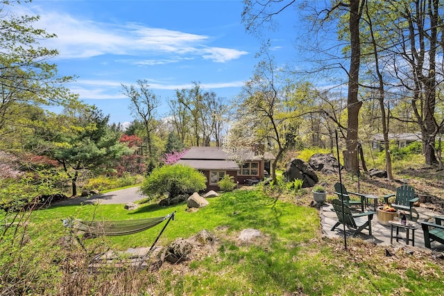 35 Riverview Trl, Croton-On-Hudson, NY 10520 - view of green lawn featuring a fire pit