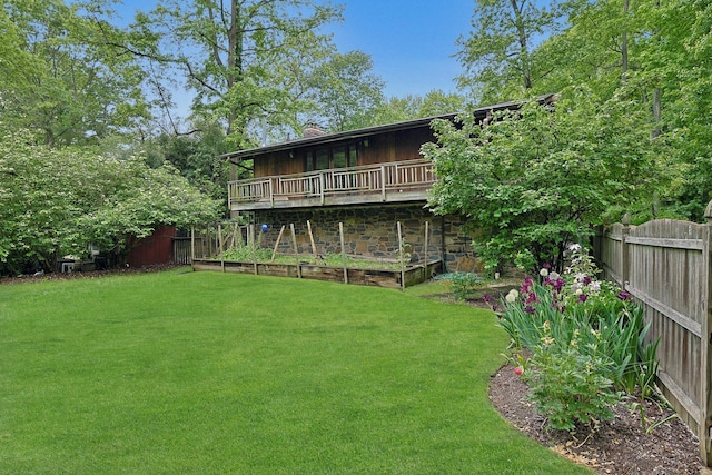 21 Woods Rd, Palisades, NY 10964 - rear view of house with a vegetable garden and stone siding