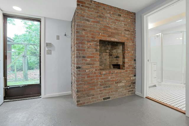 21 Woods Rd, Palisades, NY 10964 - entryway featuring baseboards, finished concrete flooring, and healthy amount of natural light