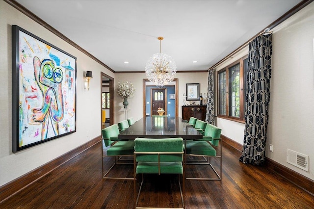 dining room with baseboards, ornamental molding, a chandelier, and dark wood-type flooring