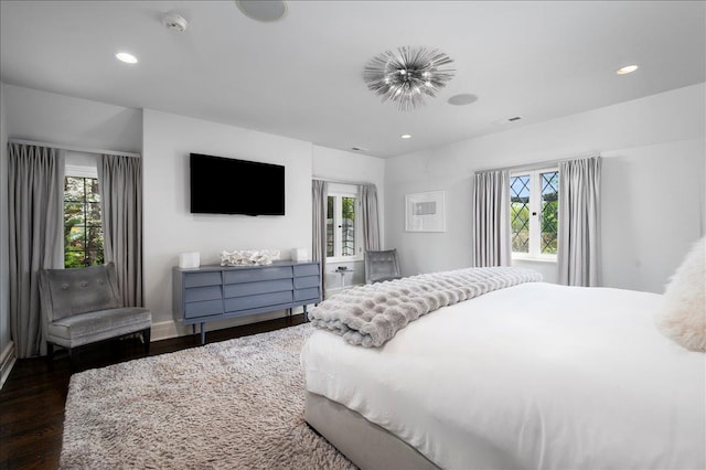 bedroom featuring recessed lighting, baseboards, french doors, and dark wood-type flooring