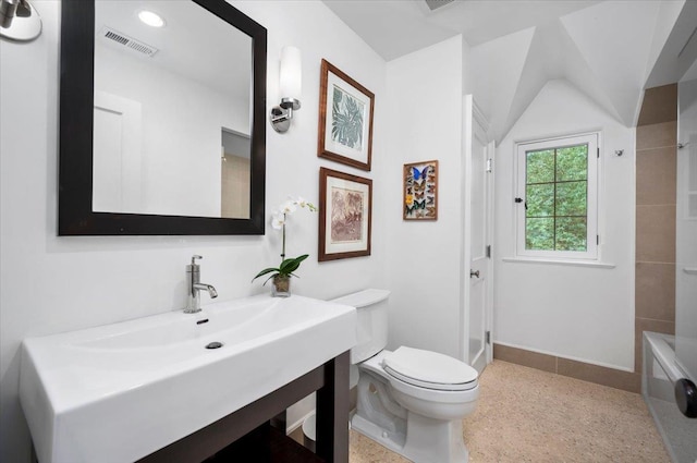 full bathroom featuring visible vents, speckled floor, a shower, baseboards, and toilet