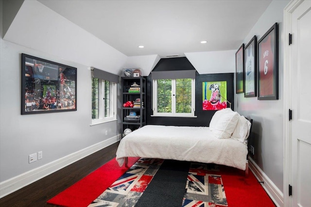bedroom with baseboards, recessed lighting, and wood finished floors