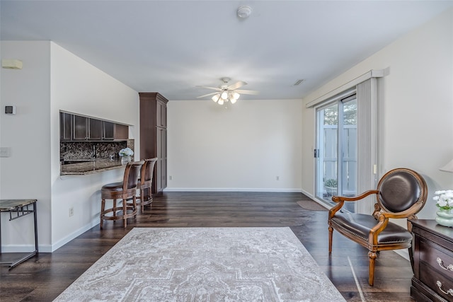 903 Sara Cir Unit 903, Port Jefferson Station, NY 11776 - living area featuring a ceiling fan, dark wood-style flooring, and baseboards