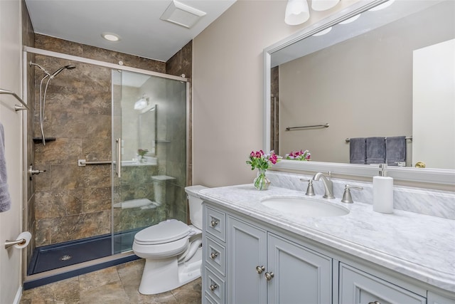 903 Sara Cir Unit 903, Port Jefferson Station, NY 11776 - bathroom with vanity, a stall shower, and toilet