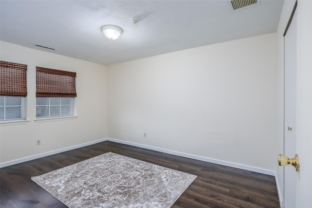 903 Sara Cir Unit 903, Port Jefferson Station, NY 11776 - unfurnished room with dark wood-style floors, baseboards, and a smoke detector