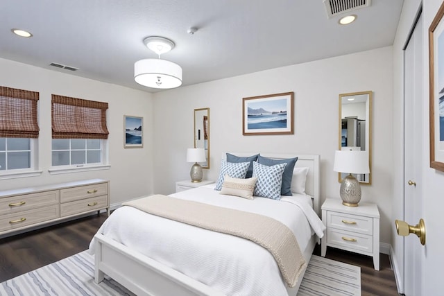 903 Sara Cir Unit 903, Port Jefferson Station, NY 11776 - bedroom with dark wood finished floors, recessed lighting, and baseboards
